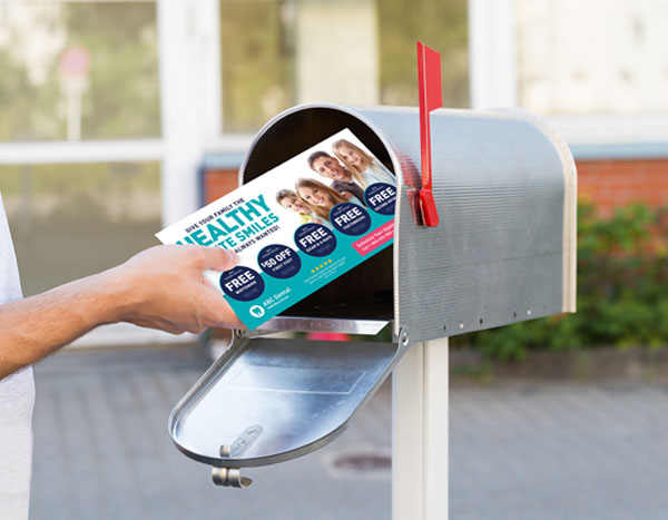 Postcard being mailed