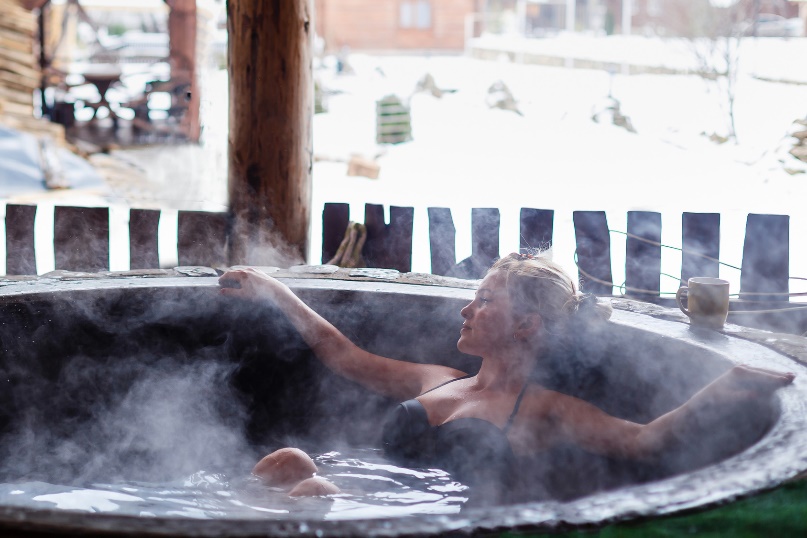 woman relaxing in hot tub